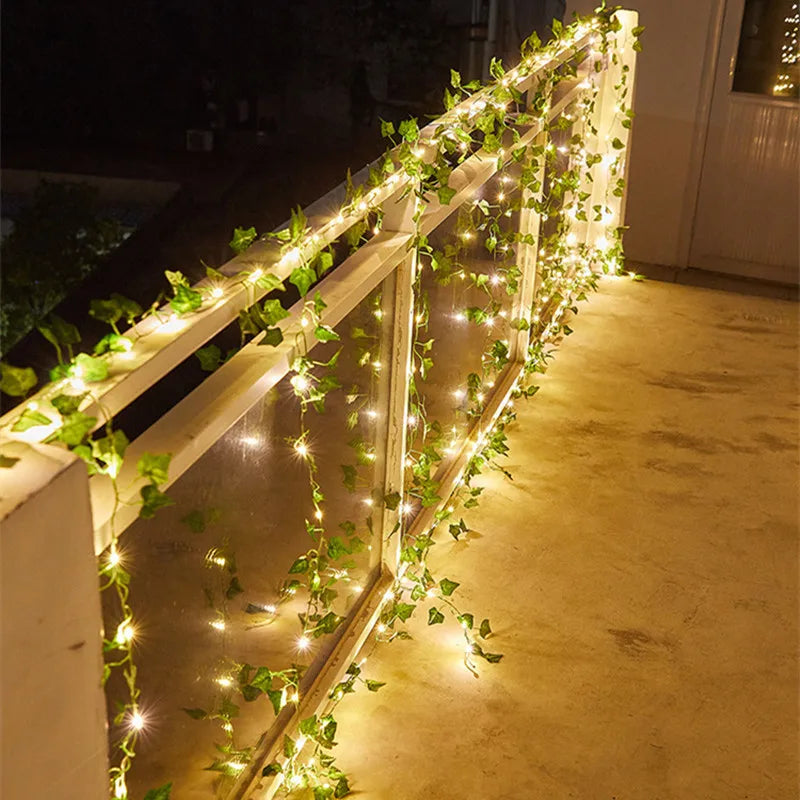 Enchanted Foliage: LED Fairy Lights with Artificial Green Leaves