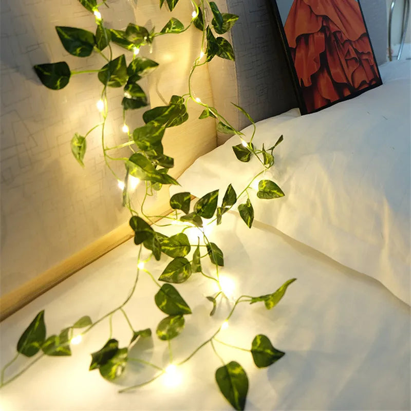 Enchanted Foliage: LED Fairy Lights with Artificial Green Leaves